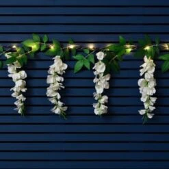 Solar Powered 180cm Artificial Leaf Garland With Wisteria Flowers - Warm White -Garden Decoration Shop 379258 180cm solar powered artificial leaf garland with wisteria flowers 20 warm white micro leds 3